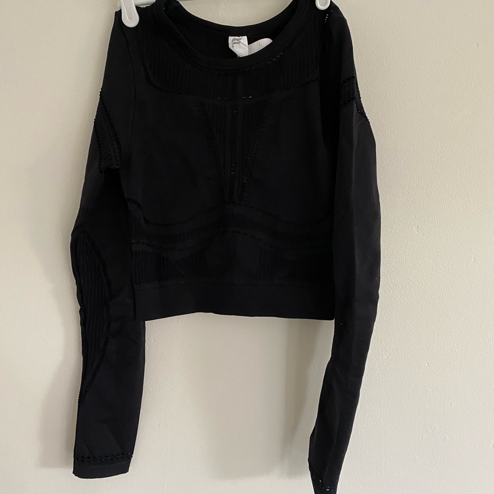 NWT Fabletics black compression cropped sports top with long sleeves.